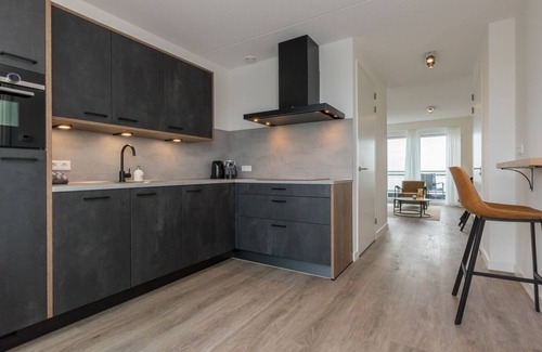 Sint-Annaland Apartment | Apartment in Sint-Annaland with Water Views