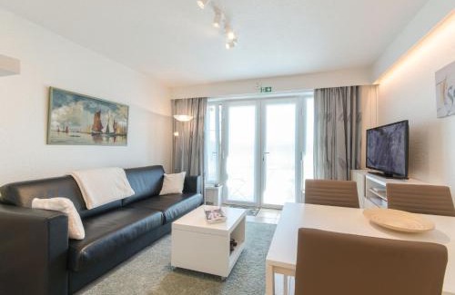 De Haan Apartment | Apartment Isabelle with parking and shared pool by Interhome