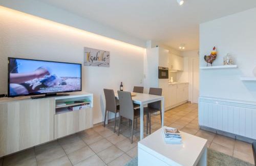 De Haan Apartment | Apartment Isabelle with parking and shared pool by Interhome