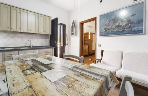 San Giovanni Suergiu Apartment | Apartment '1' with Shared Garden and Air Conditioning