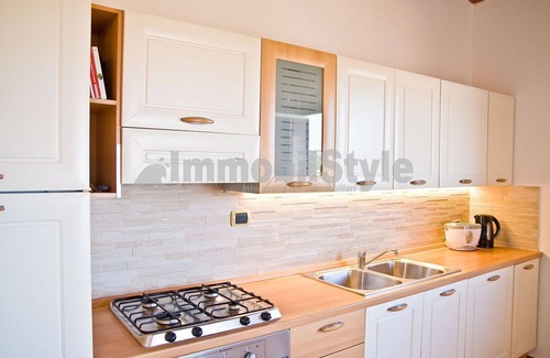 Porto Pozzo Apartment | Apartment with terrace and sea view