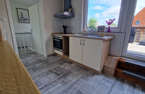 Norddeich Apartment | Apartment 'Janina' with Private Terrace, Balcony and Wi-Fi
