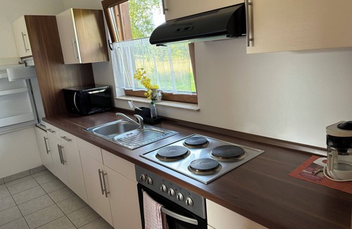 Lahnstein auf der Hohe Apartment | Apartment kitchen and bedroom - in the middle of the countryside - 15 minutes to Koblenz