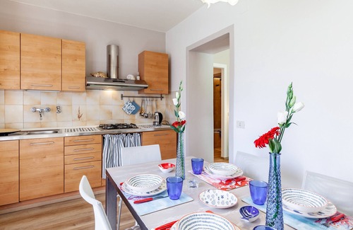 Lido di Camaiore Apartment | Apartment 'La Casa Rossa Versilia' with Mountain View, Shared Garden and Wi-Fi