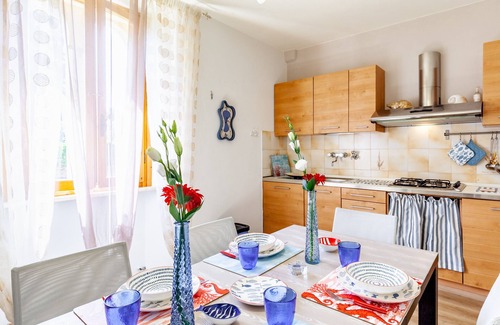 Lido di Camaiore Apartment | Apartment 'La Casa Rossa Versilia' with Mountain View, Shared Garden and Wi-Fi