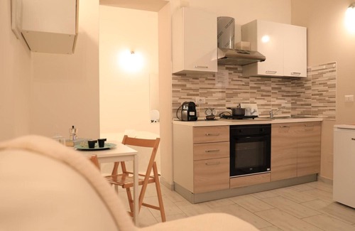 Sassari Apartment | Apartment 'La Corte Di Santa Maria' with Wi-Fi and Air Conditioning