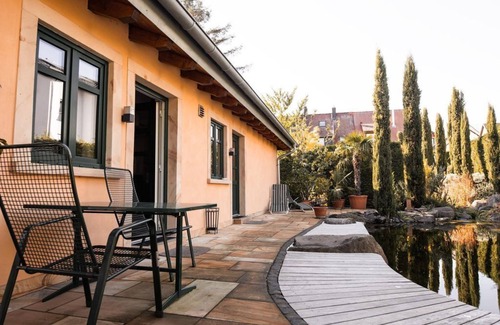 Kindenheim Apartment | Apartment "Magnolia" - "Living in the garden of the senses"