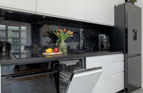 Dziwnow Apartment | Apartment Overlooking the River, Pool, Dziwnow