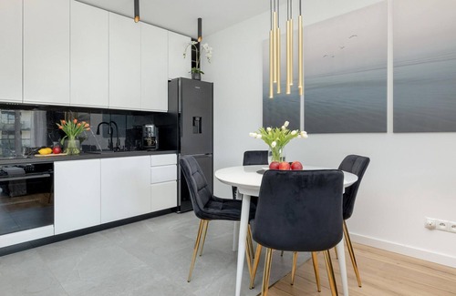 Dziwnow Apartment | Apartment Overlooking the River, Pool, Dziwnow