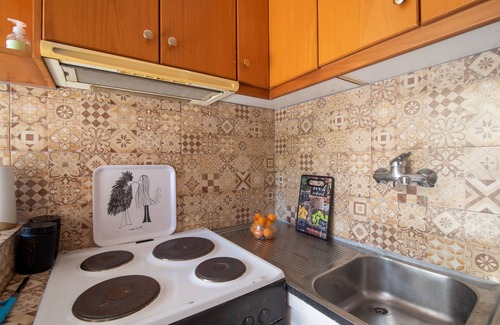 Kanoni Apartment | Apartment "Palaiopolis House" with Mountain View, Wi-Fi & Terrace