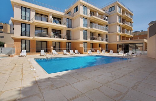 Atalaia Apartment | Apartment 'Praia Areia Branca' with Sea View, Shared Pool and Wi-Fi