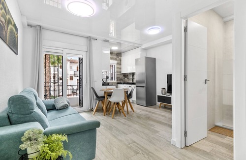 Punta Prima Apartment | Apartment 'Punta Prima Palm Beach' with Shared Pool, Balcony and Wi-Fi