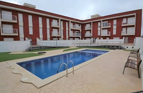 Sant Jaume d'Enveja Apartment | Apartment 'Real Dreams' with Shared Pool, Wi-Fi and Air Conditioning