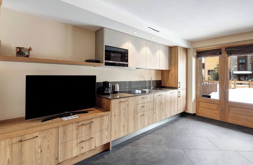 Livigno Apartment | Apartment 'Rasia Residence Relax' with Mountain View, Shared Garden and Wi-Fi