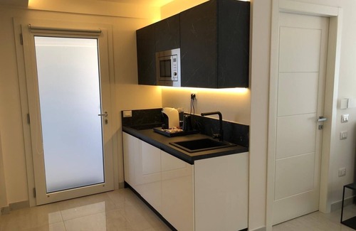 Villa San Pietro Apartment | Apartment "Residence Meridian Unità 7" Near the Beach with Mountain View, Pool, A/C, Wi-Fi & Balcony