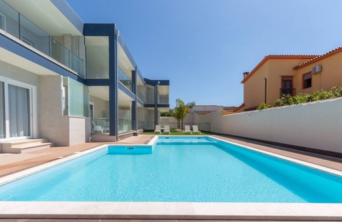 Villa San Pietro Apartment | Apartment "Residence Meridian Unità 4" Near the Beach with Mountain View, Pool, A/C, Wi-Fi & Balcony