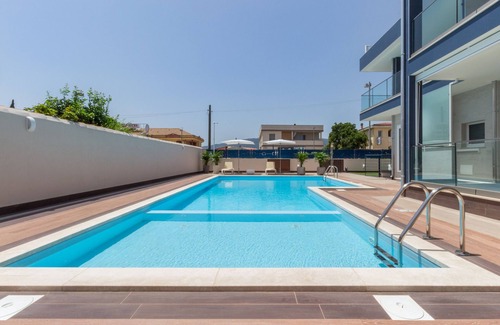Villa San Pietro Apartment | Apartment "Residence Meridian Unità 1" Near the Beach with Mountain View