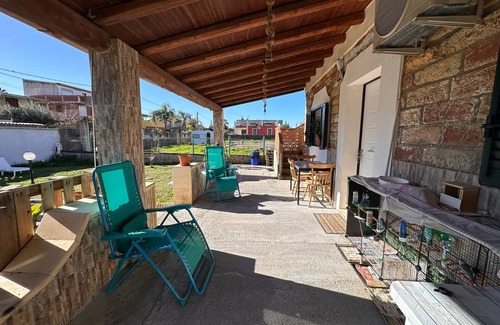 Agnone Bagni Apartment | Apartment 'Serena A Due Passi Dal Mare' with Shared Garden, Wi-Fi and Air Conditioning