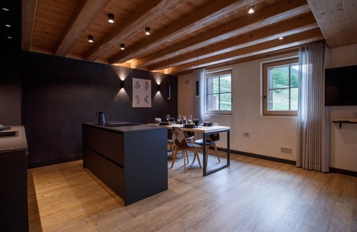 Livigno Ski Chalet | Apartment 'Snow Villa Genf' with Mountain View, Shared Spa Area and Garden
