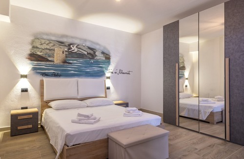 Sassari Apartment | Apartment 'Torre Di Abbacurrente' with Wi-Fi and Air Conditioning