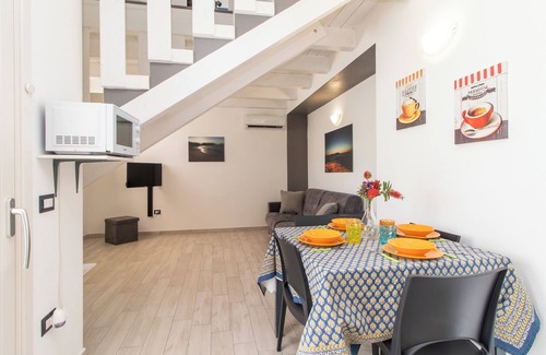 Trinita d'Agultu e Vignola Apartment | Apartment "Ulivi 17" with Sea View, A/C, Terrace, Reserved Parking and Wi-Fi