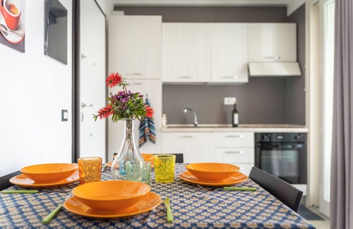 Trinita d'Agultu e Vignola Apartment | Apartment "Ulivi 17" with Sea View, A/C, Terrace, Reserved Parking and Wi-Fi