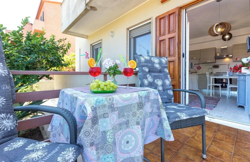 Alghero Apartment | Apartment Uva Regina near the Beach with Garden, Terrace, Balcony & A/C