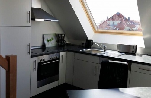 Grossenbrode Apartment | Apartment with gallery, whirlpool and fireplace