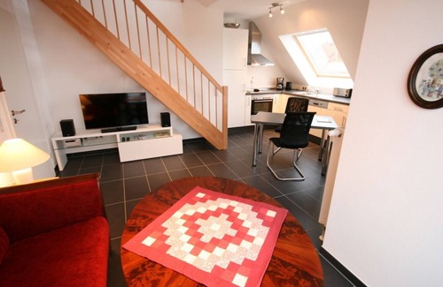 Grossenbrode Apartment | Apartment with gallery, whirlpool and fireplace