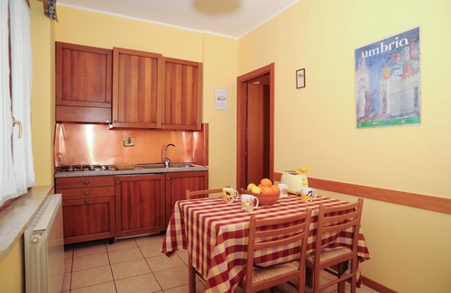 Santa Maria degli Angeli Apartment | Apartment with garden and swimming pool with splendid view of Assisi