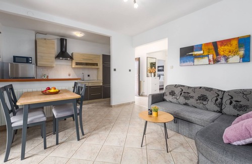 Susnjici Apartment | Apartment with pool, garden, air conditioning, barbecue, children's playground