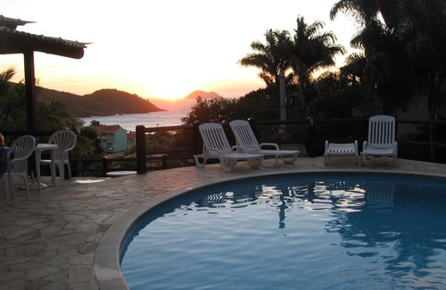 Joao Fernandes Apartment | Apartment with sunset view of the sea in condominium with swimming pool 70m from the best beach in buzios