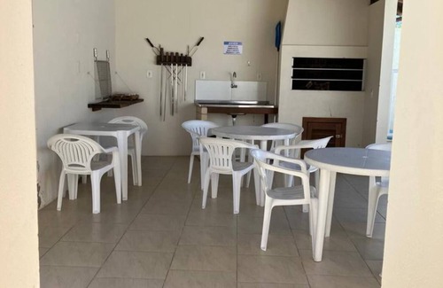 Barra de Ibiraquera Apartment | Apartment with two suites, two blocks from the sea and three from the lagoon.