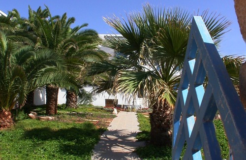 Trifylia Apartment | Apartments for 4 -5 people/romantic palm garden - right on the sea