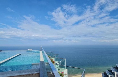 Suoi Nuoc Beach Apartment | Apec Mandala Mũi Né with Infinity Pool