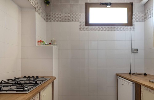 Sassari Apartment | Appartamento Due Posti with Sea View, Pool, Wi-Fi, Garden & Terrace