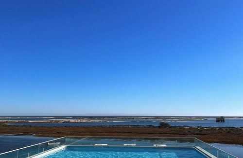 Olhao Apartment | Appartement Luxueux Face à la ria Formosa Dans un Villa .plage à 5mn à Pied