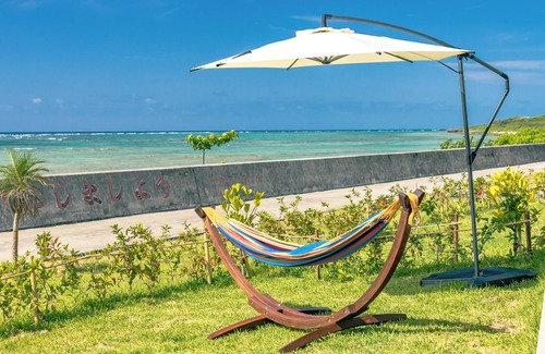 Taketomi-jima Taketomi-cho House | Approximately 10 minutes drive to downtown and airport! Stay" ⇨ "Live" "Another Home by the Sea" - Enjoy an extraordinary experience on Ishigaki Island and spend your time as you would in everyday life.