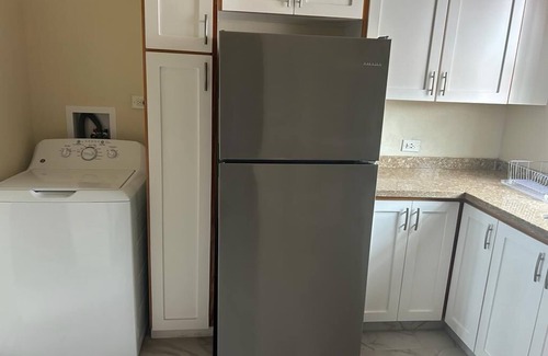 Enterprise House | Apt #1-Newly built apartments, great for families/friends, minutes walk to beach