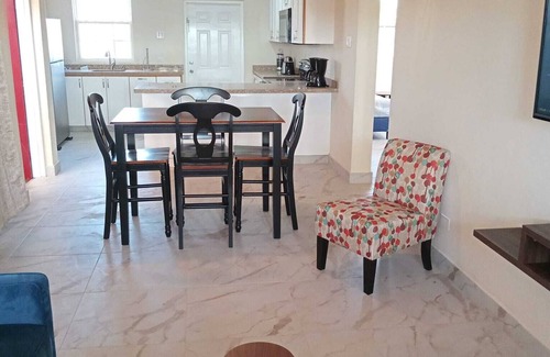 Enterprise House | Apt #1-Newly built apartments, great for families/friends, minutes walk to beach