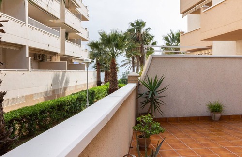 Castell de Ferro Apartment | Apto Castell Beach. Apartment with a spacious seaside terrace.