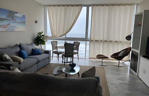 Centro House | Apto vista mar em Pitangueiras, Guarujá