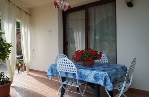 San Teodoro Apartment | Aquamarine villa with garden and wifi