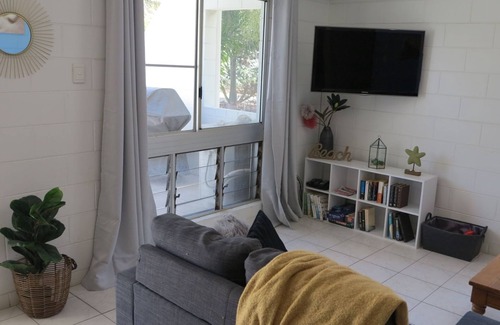 Arcadia Apartment | Arcadia Beach Unit 4 - Charming sunny apartment with front row balcony view over Geoffrey Bay