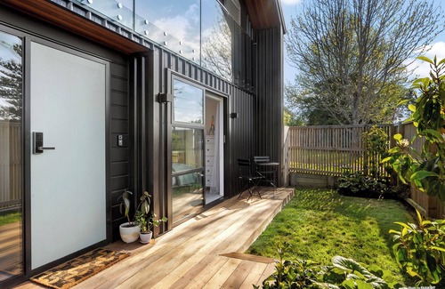 Te Atatu Peninsula House | Architecturally designed stunning trophy home with sea views, on a quiet street.