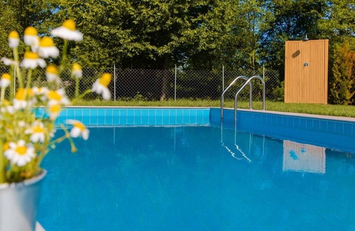Anopolis Apartment | Aristotelia Gi Studio - Cozy Poolside Bliss