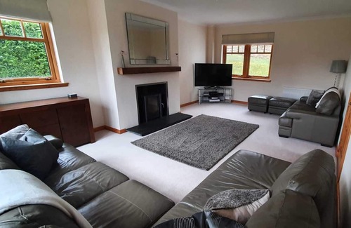 Spean Bridge House | Arkaig Lodge - a modern, tastefully furnished property in a stunning location.
