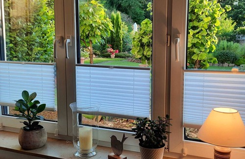 Annweiler am Trifels Condo | Arrive and feel at home! First floor apartment with a view of the garden paradise