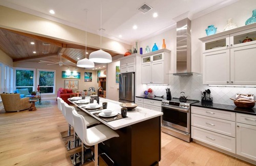 Longbeach Village House | Arts & Vines: LBK Pool Spa Dog Friendly by Anna Maria Life Vacation Rentals