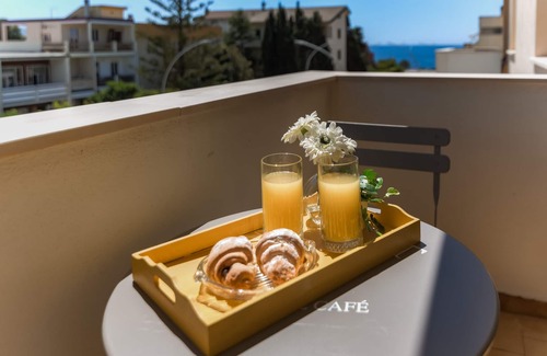 Fertilia Apartment | At Dario's house: a stone's throw from the sea with parking space